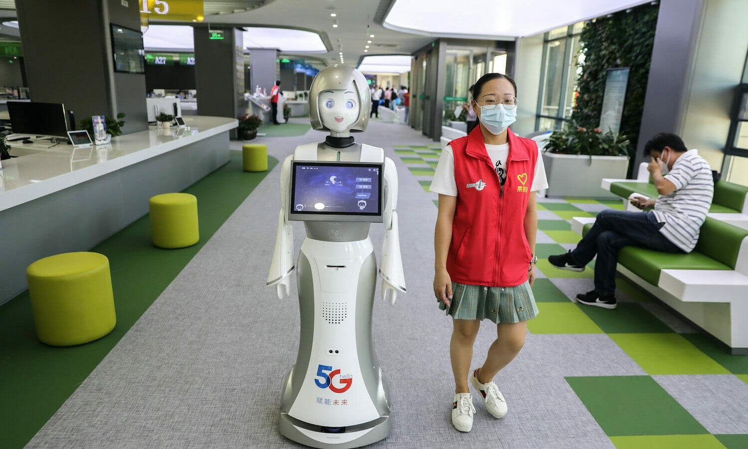 A 5G-supported intelligent robot works at the administration service centre on August 14, 2020 in Zhoushan, Zhejiang Province of China. China announced a new global data security program, which seemed tat least in part  to be in response to restrictions or outright banning by Western allies of the use of Chinese telecommunication equipment manufact...