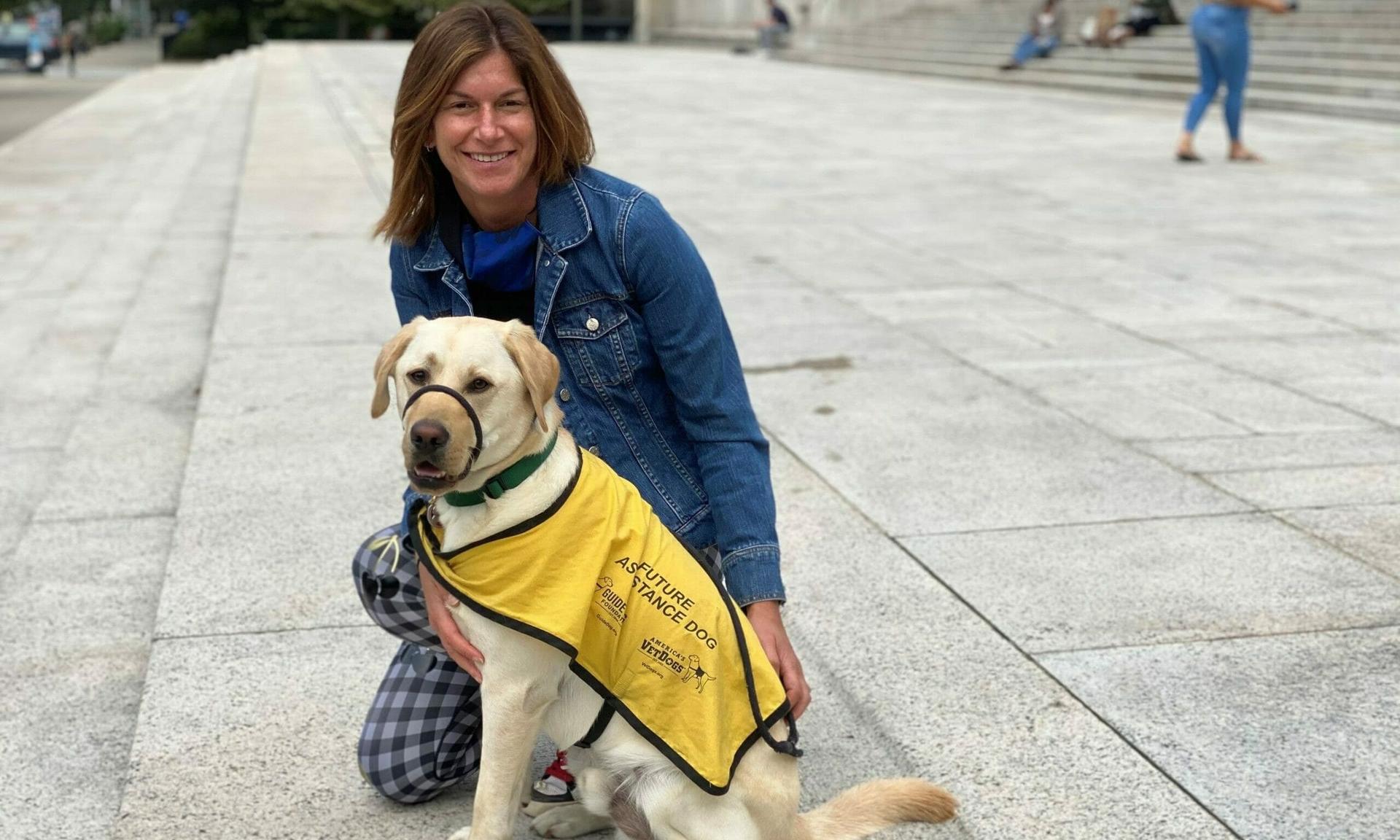 In addition to her role at Deloitte, Deborah Golden trains guard dogs for the Guide Dog Foundation.