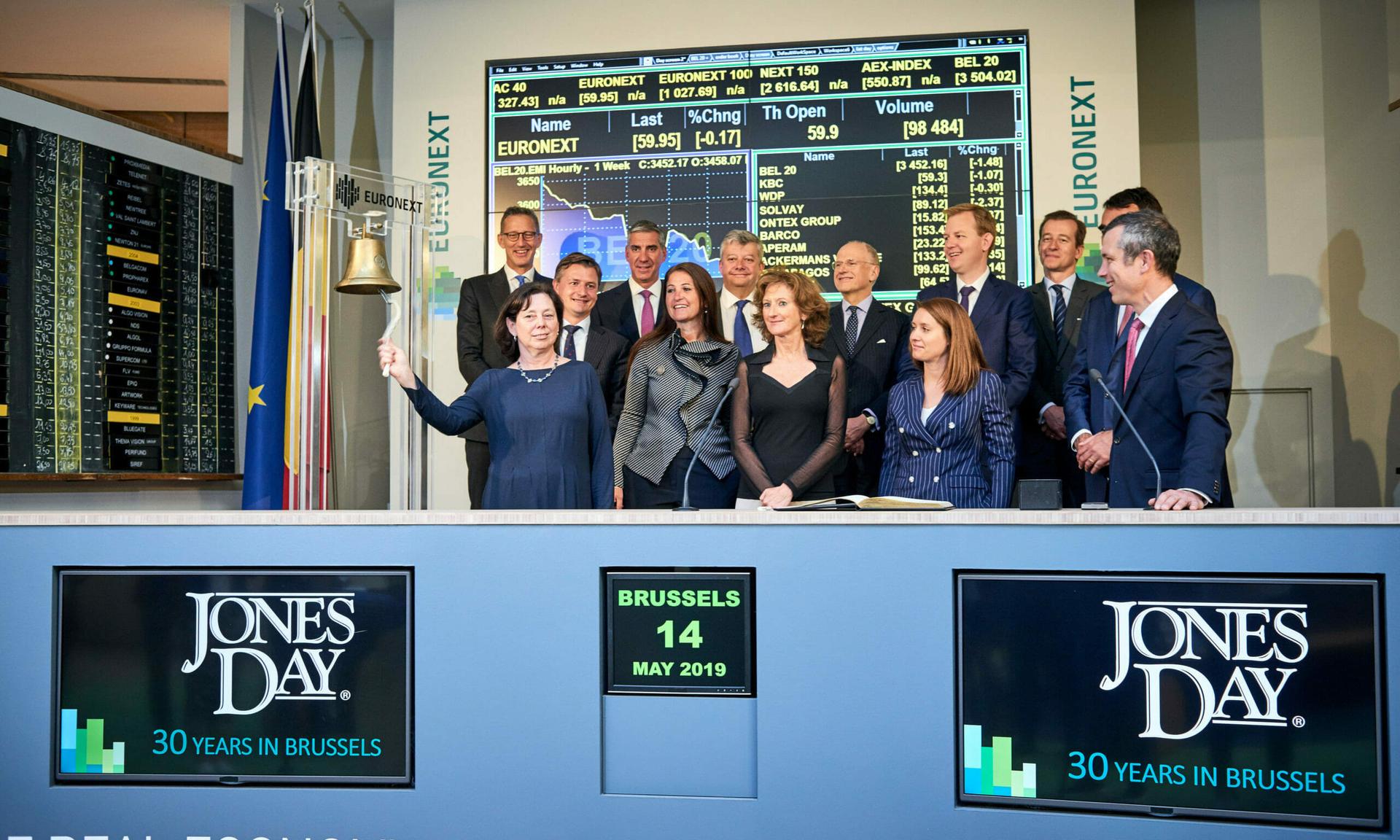 Jones Day executives in 2019 open the trading day during a Bell Ceremony to celebrate Jones Day’s 30 years of presence in Brussels.   (Euronext)