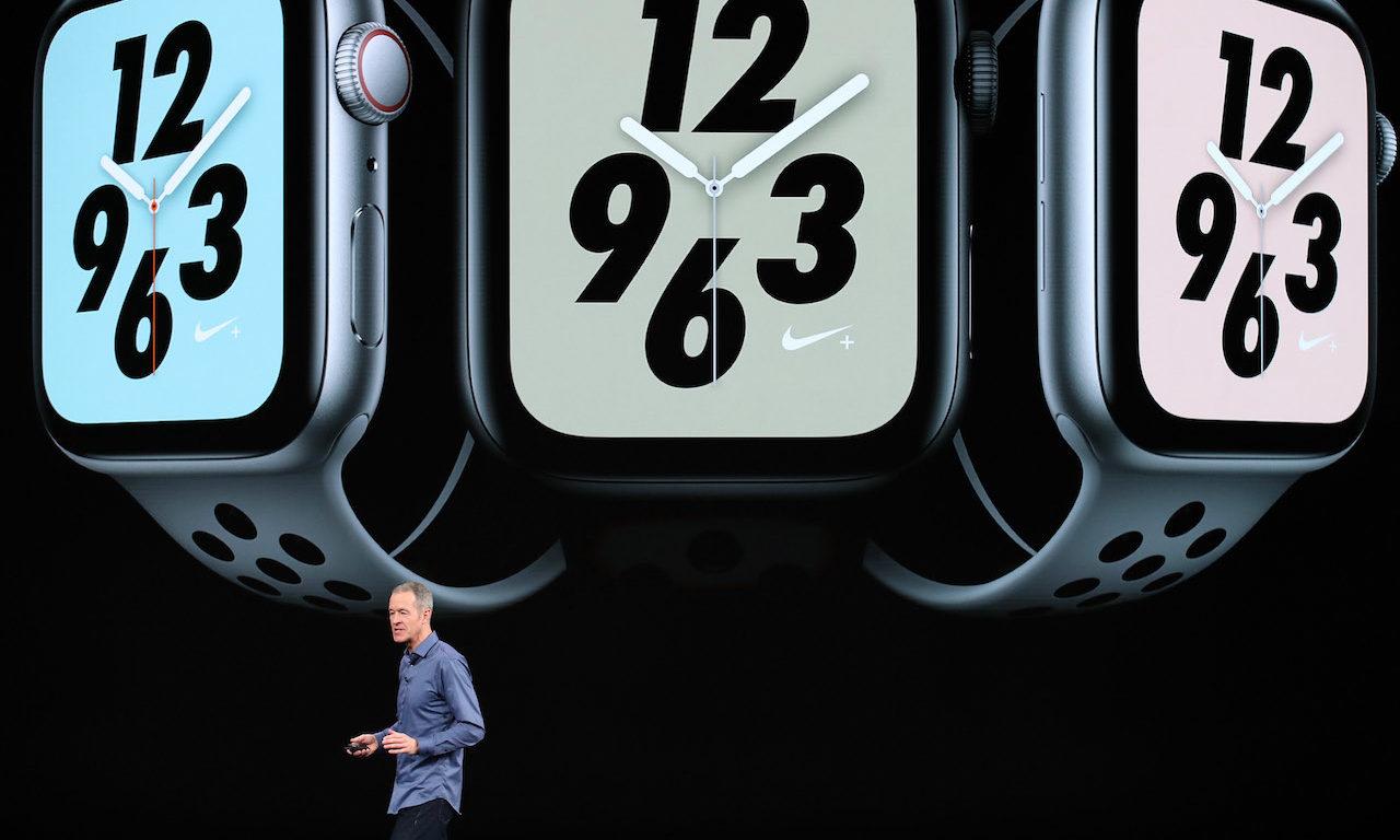 Jeff Williams, chief operating officer of Apple Inc., speaks during an Apple event  with imagery of the Apple Watch above. (Photo by Justin Sullivan/Getty Images)