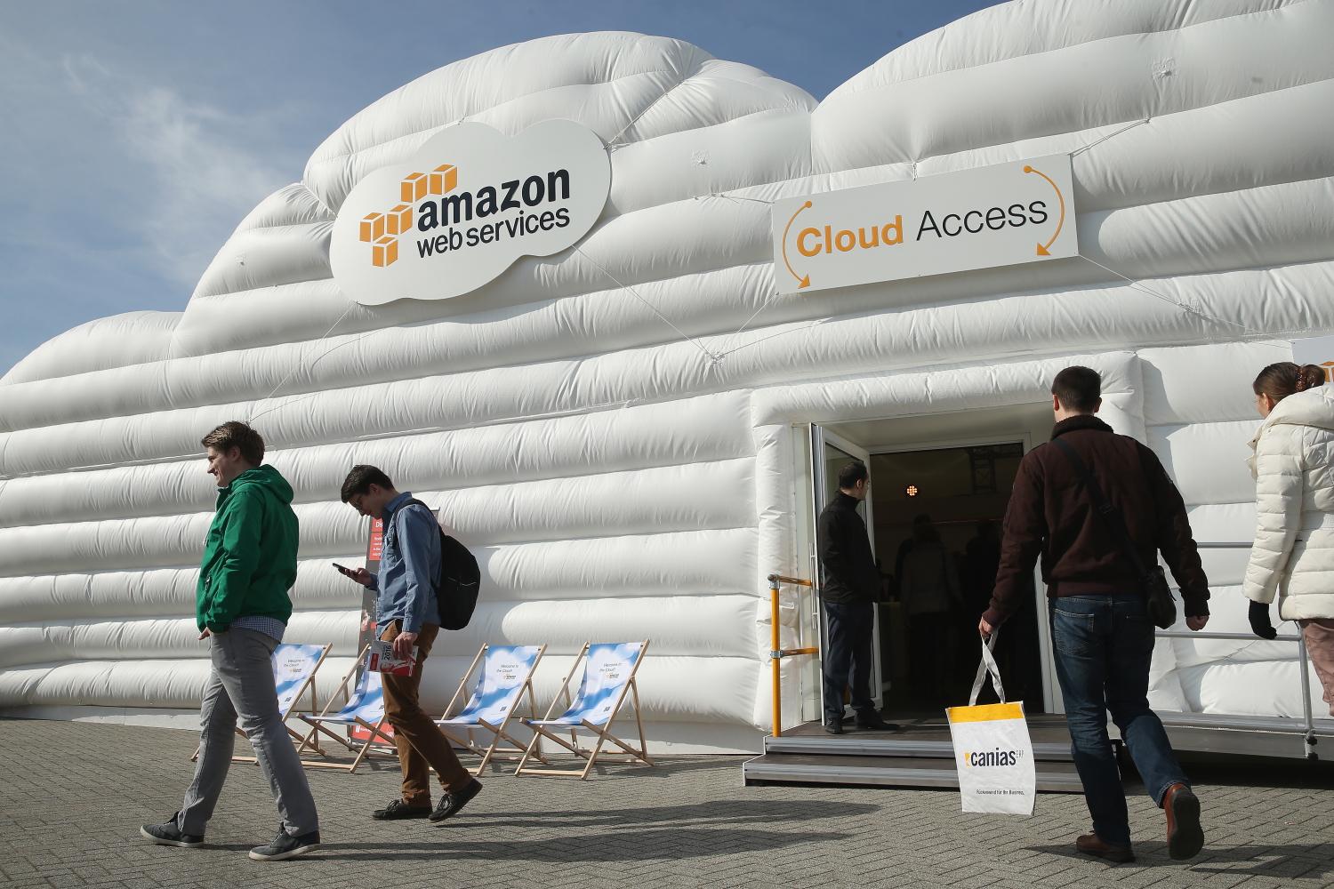 Visitors arrive at the cloud pavillion of Amazon Web Services at a technology trade fair on March 14, 2016, in Hanover, Germany. (Sean Gallup/Getty Images)