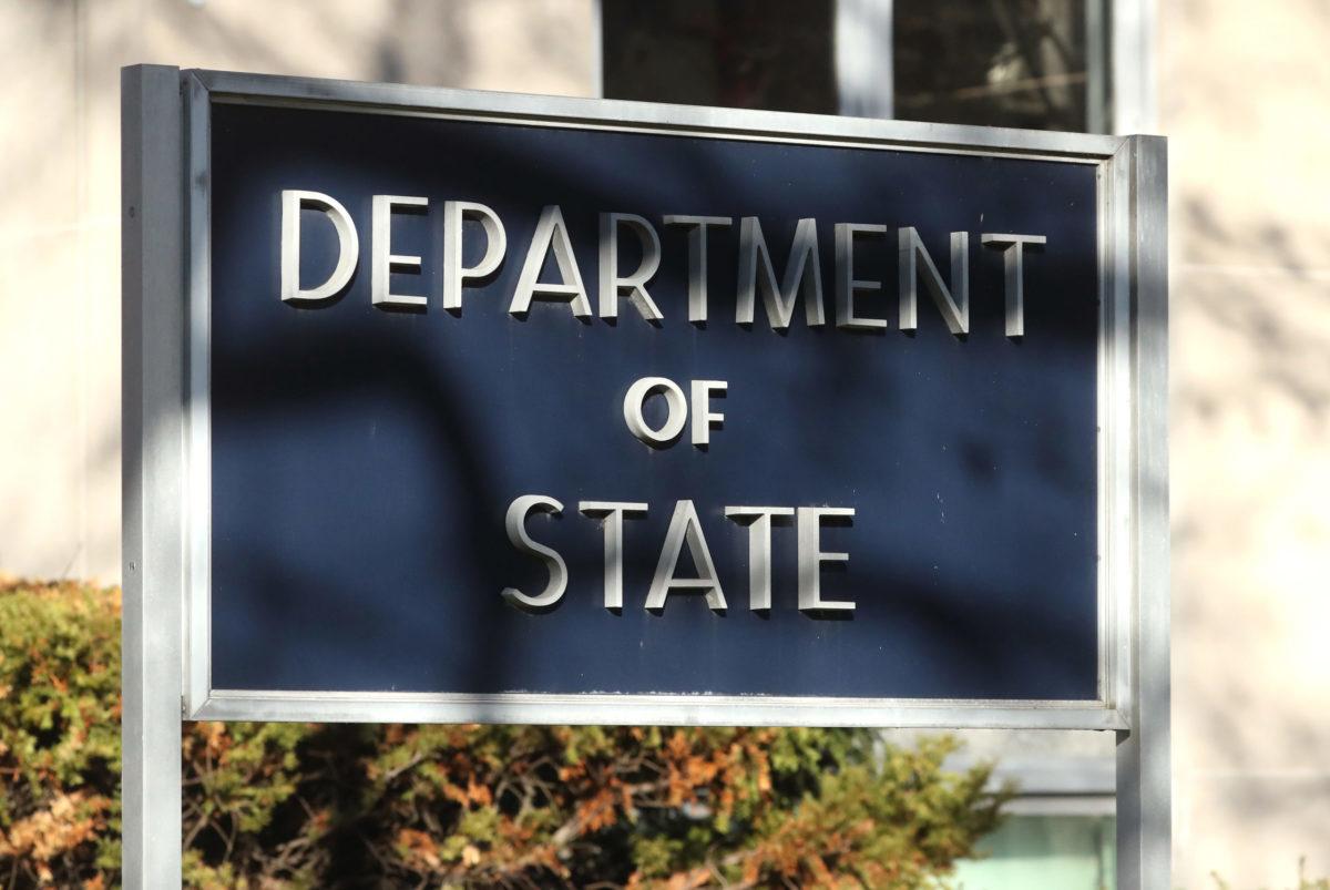 A sign identifies the State Department.