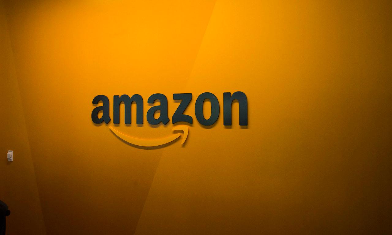 An Amazon logo is seen inside the Amazon corporate headquarters on June 16, 2017 in Seattle, Washington. (Photo by David Ryder/Getty Images)