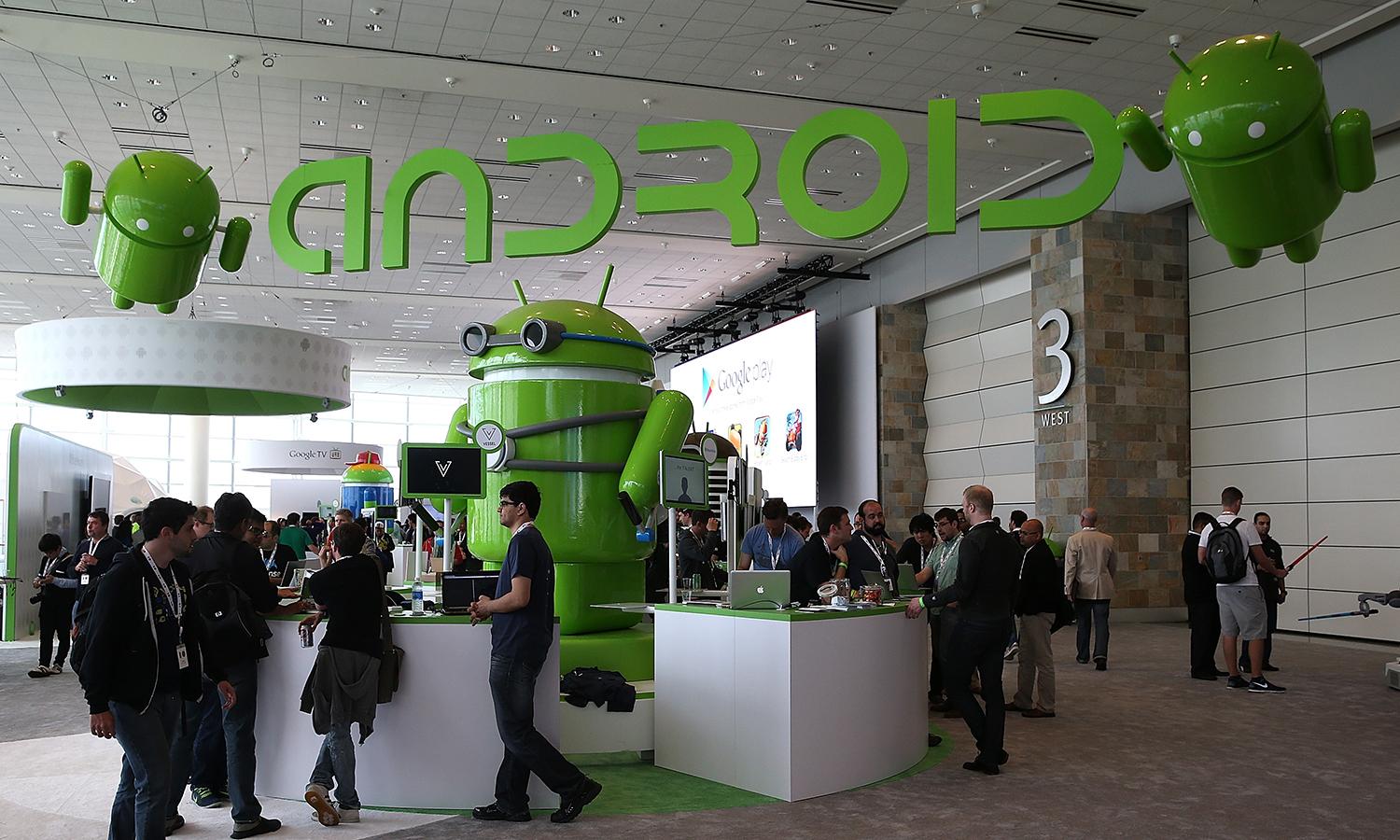 Attendees visit the Android booth during the Google I/O developers conference at the Moscone Center on May 15, 2013, in San Francisco. (Photo by Justin Sullivan/Getty Images)