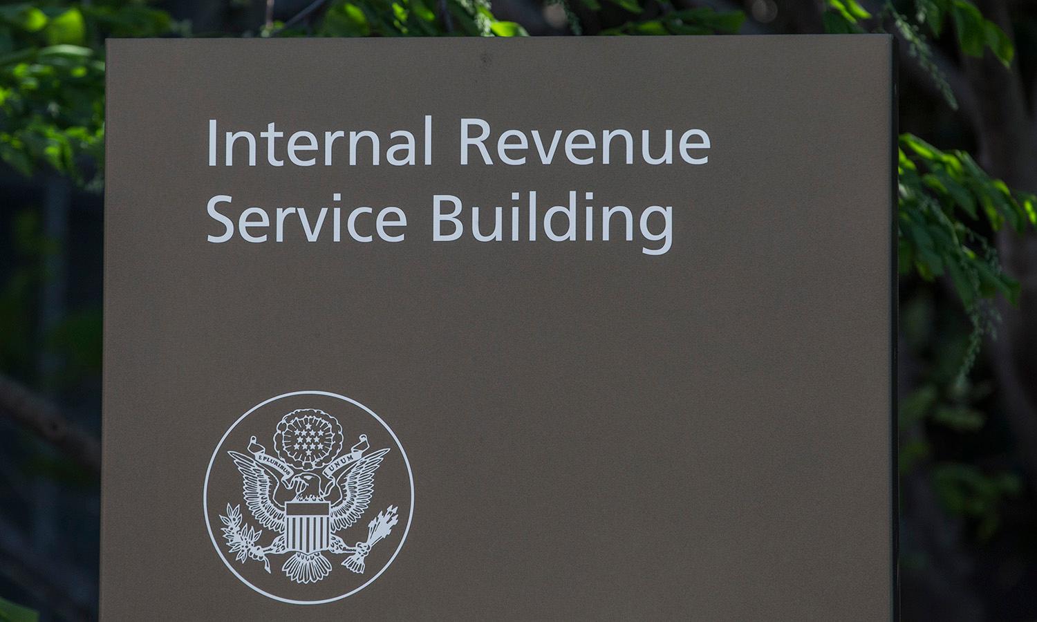 Members of Congress are turning up the heat on the IRS over its planned use of facial recognition for taxpayers seeking to access their IRS.gov accounts. Pictured: The IRS building on April 15, 2019, in Washington. (Photo by Zach Gibson/Getty Images)