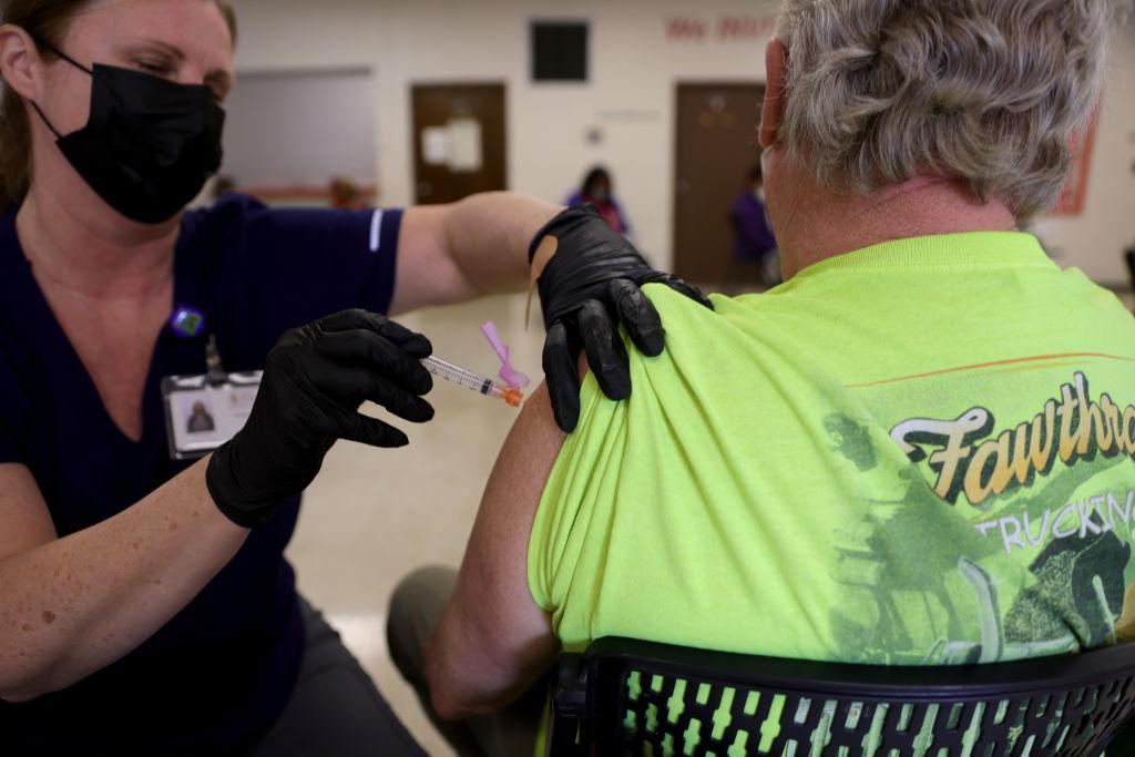 COVID-19 vaccinations and treatments have continued amid the Maryland Department of Health ransomware attack recovery. But MDH has yet to fully restore surveillance data. (Photo by Win McNamee/Getty Images)
