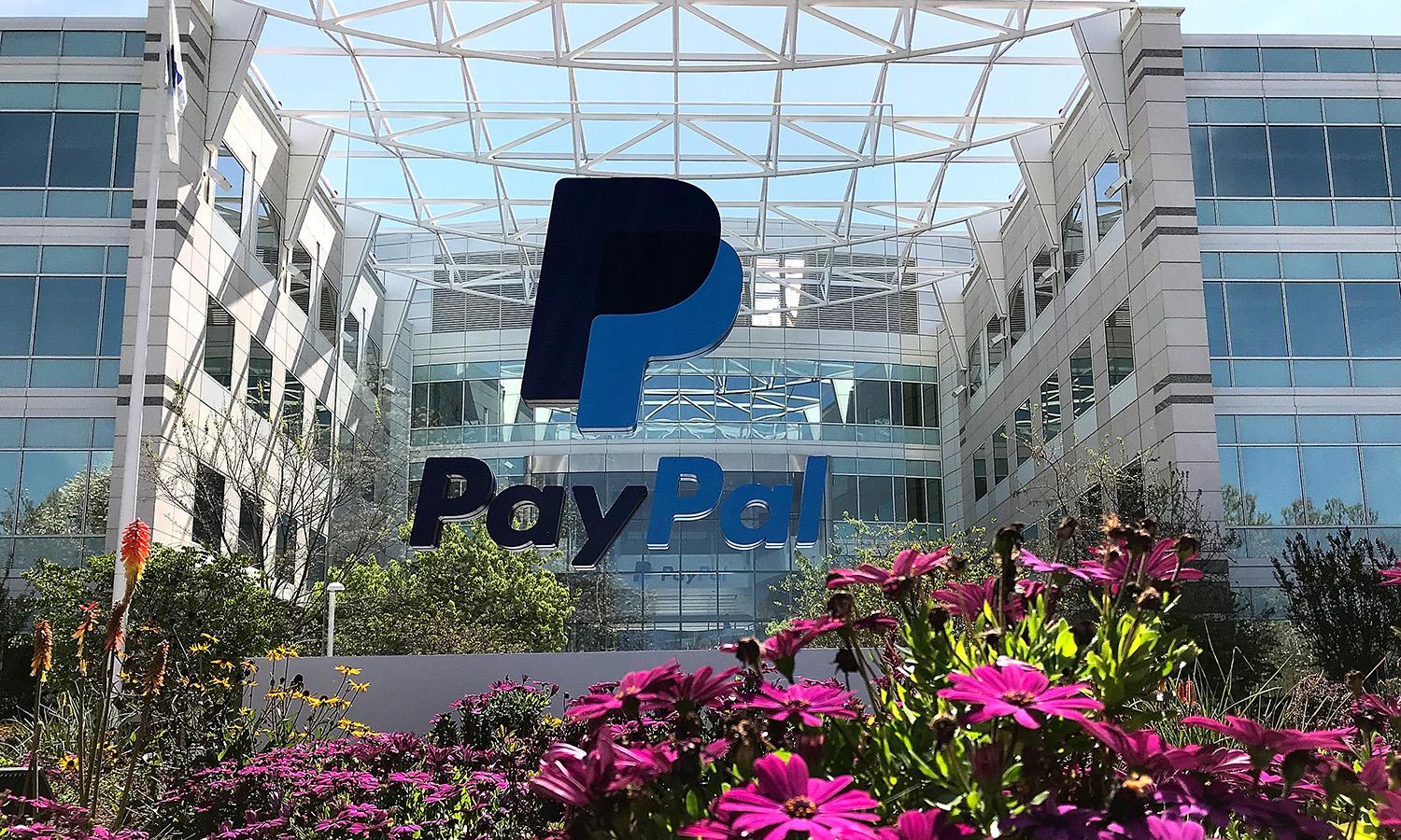New technologies like artificial intelligence are helping make real-time payments more secure. Pictured: A sign is posted outside of the PayPal headquarters on April 9, 2018, in San Jose, Calif. (Photo by Justin Sullivan/Getty Images)