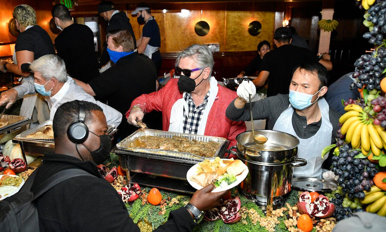 Comedians Tom Dreesen, Frazer Smith and Thom Tran serve food at the 41st free Thanksgiving dinner at The Laugh Factory on November 25, 2021 in West Hollywood, Calif. Today&#8217;s columnist, Josh Yavor of Tessian, says too many security team members are pressured into missing important family holidays, a situation that CISOs need to get proactive a...