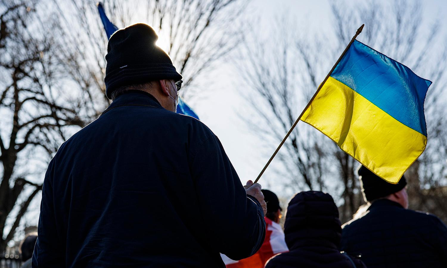 Pro-Ukrainian activists gather for a prayer and demonstration against Russian aggression in front of the White House on Feb. 6, 2022, in Washington. (Photo by Samuel Corum/Getty Images)