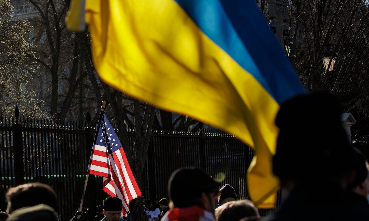 Pro-Ukrainian activists gather for demonstration against Russian aggression in front of the White House on Feb. 6, 2022, in Washington. Russia has amassed tens of thousands of troops on its border with Ukraine. Cyber experts warn that sanctions resulting from the row could squash any progress in cooperation on ransomware counter measures. (Photo by...