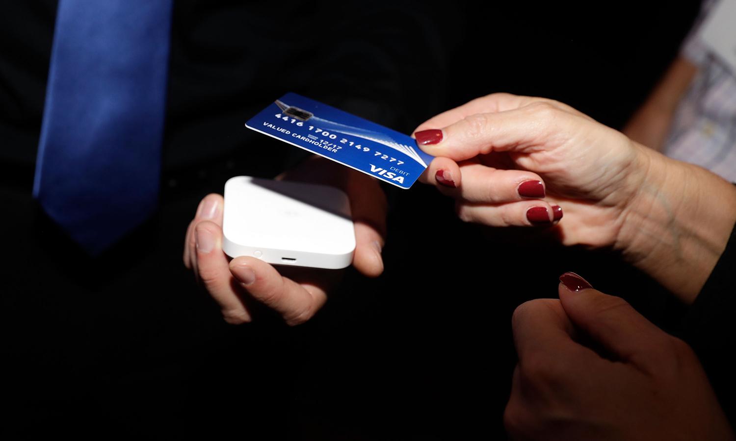 The PCI Standards Security Council released version 4.0 of the PCI Data Security Standard on Thursday. Pictured: Guests tap to pay using contactless cards during the Visa ID Intelligence launch party at Money 20/20 on Oct. 23, 2017, in Las Vegas. (Photo by Isaac Brekken/Getty Images for VISA Inc)