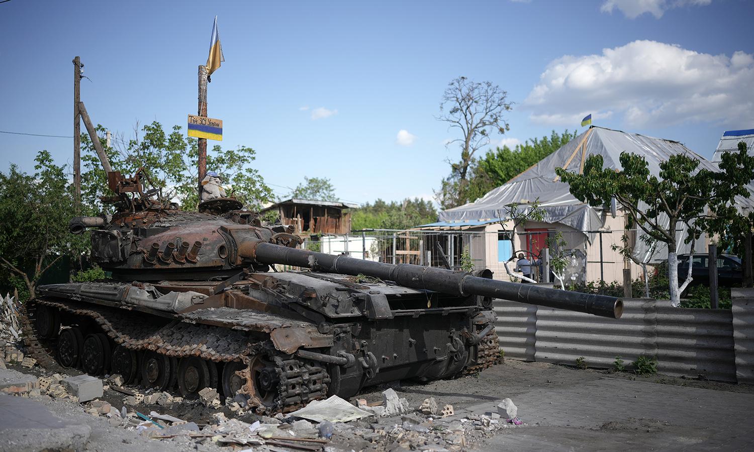 A child&#8217;s toy sits on top of a destroyed Russian tank on May 24, 2022, in Hostomel, Ukraine. (Photo by Christopher Furlong/Getty Images)