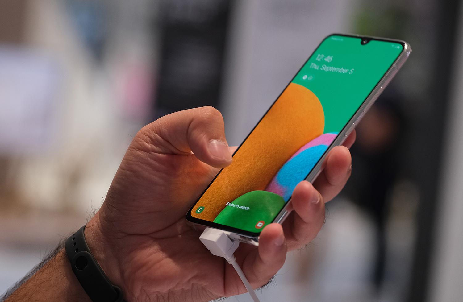 The Bahamut threat group has reemerged from a year silence to target Android mobile devices in the Middle East and South Asia. Pictured: Visitors have a look at the Samsung A90 5G smartphone at the 2019 IFA home electronics and appliances trade fair on Sept. 5, 2019, in Berlin. (Photo by Sean Gallup/Getty Images)