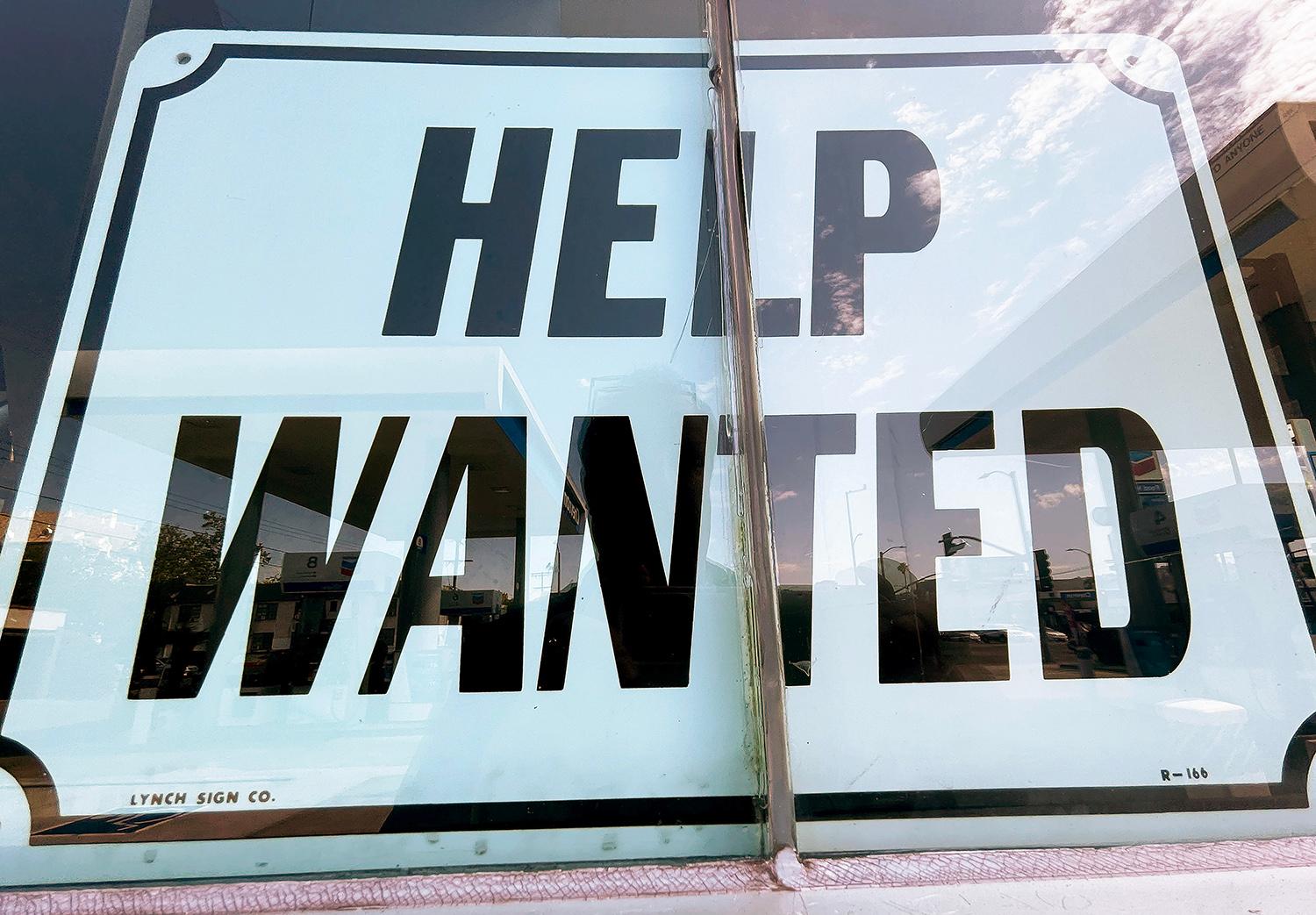 Most organizations don&#8217;t do a good job of documenting institutional knowledge, a Forrester analyst says. Pictured: A &#8220;Help Wanted&#8221; sign is displayed at a gas station on June 23, 2021, in Los Angeles. (Photo by Mario Tama/Getty Images)