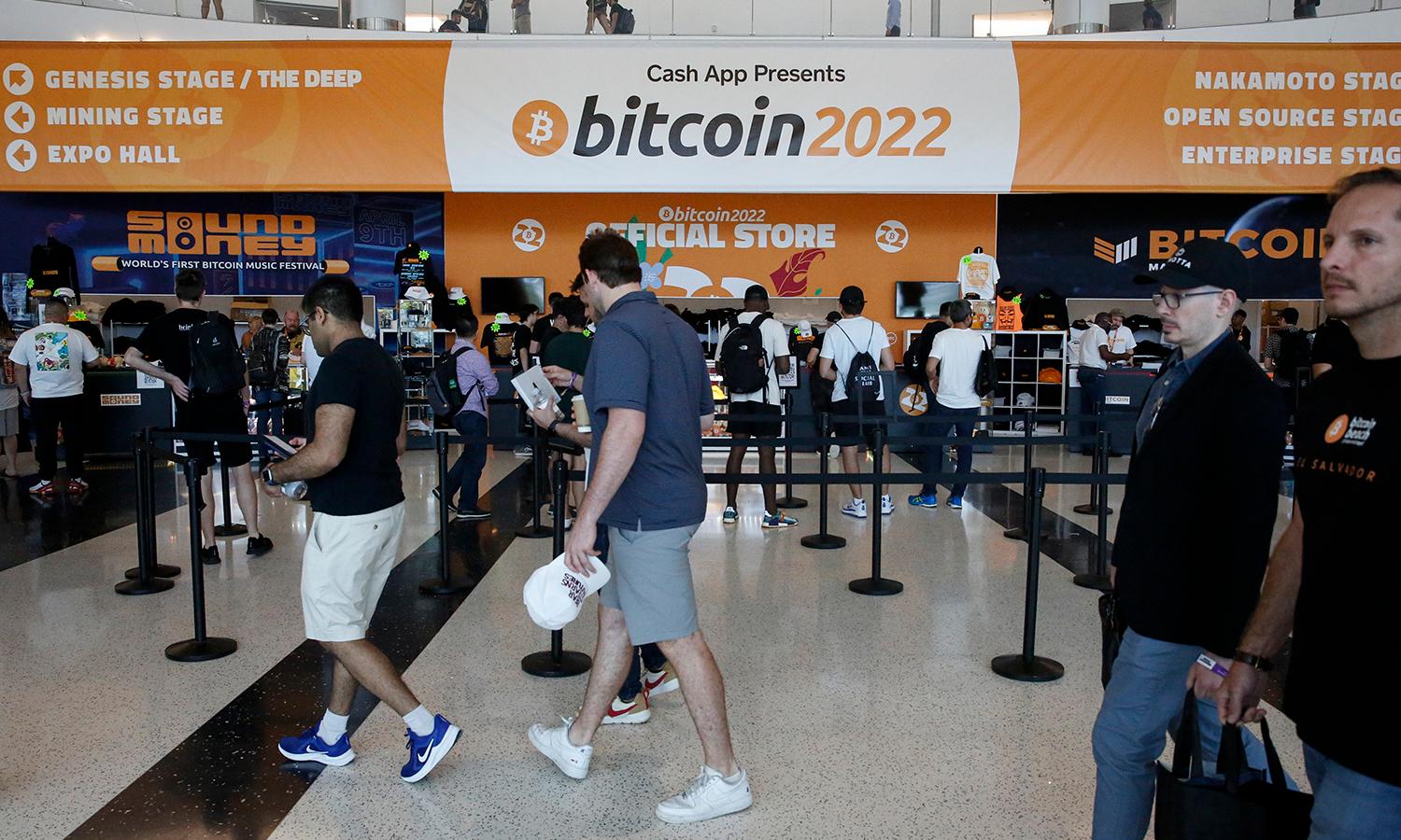 People attend the Bitcoin 2022 Conference at Miami Beach Convention Center on April 8, 2022, in Miami.(Photo by Marco Bello/Getty Images)