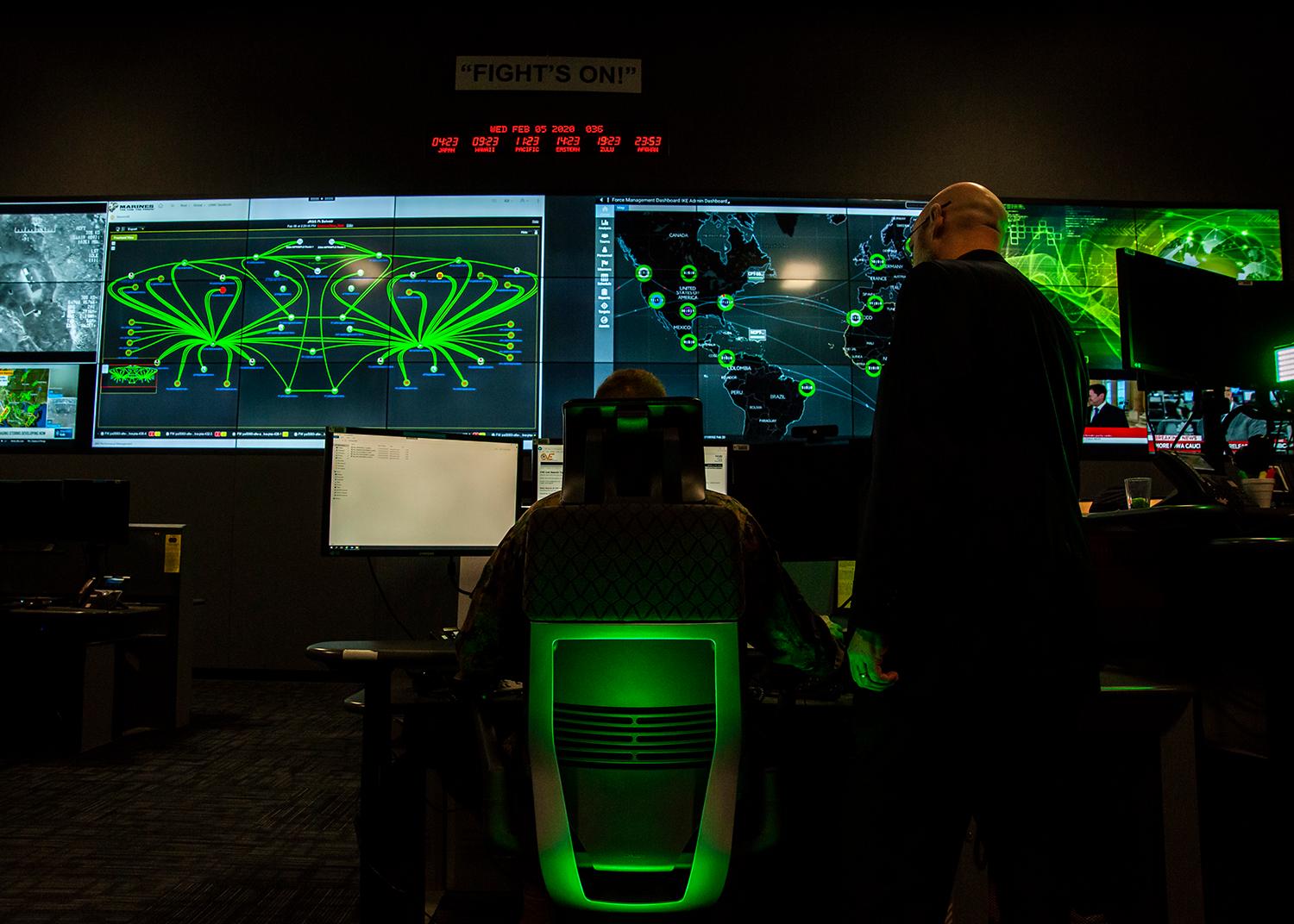 Cybersecurity personnel work in a cyber operations center