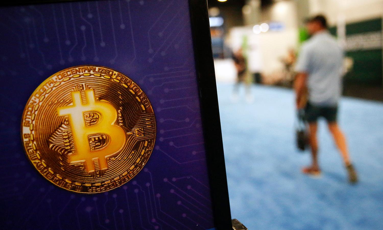 MIAMI, FLORIDA &#8211; APRIL 8: A bitcoin logo is seen during the Bitcoin 2022 Conference at Miami Beach Convention Center on April 8, 2022 in Miami, Florida. The worlds largest bitcoin conference runs from April 6-9, expecting over 30,000 people in attendance and over 7 million live stream viewers worldwide.(Photo by Marco Bello/Getty Images)