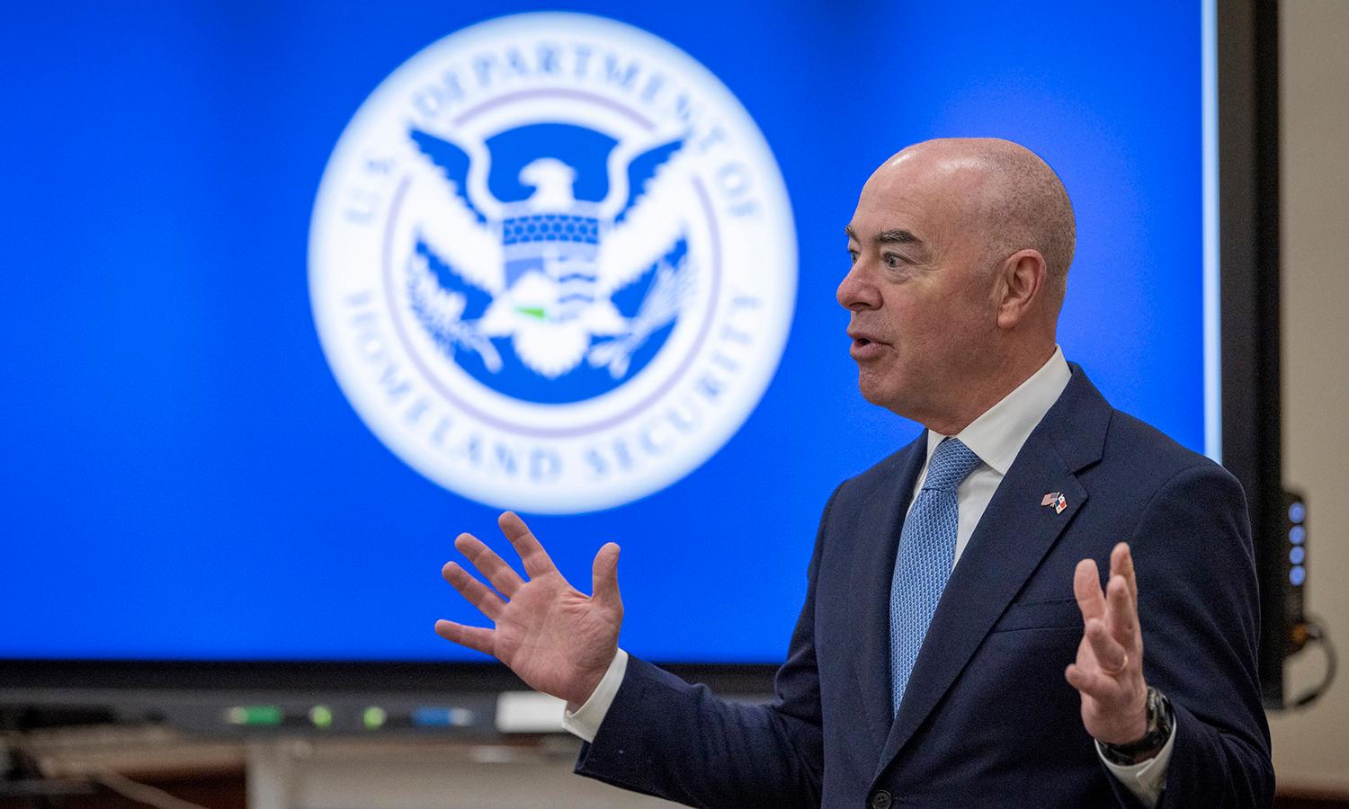 The Brennan Center for Justice is suing federal government and Department of Homeland Security to obtain records on how it uses a trio of social media surveillance contractors. Pictured: Homeland Security Secretary Alejandro Mayorkas meets with staff members at the U.S. Embassy in Panama in April. (DHS)