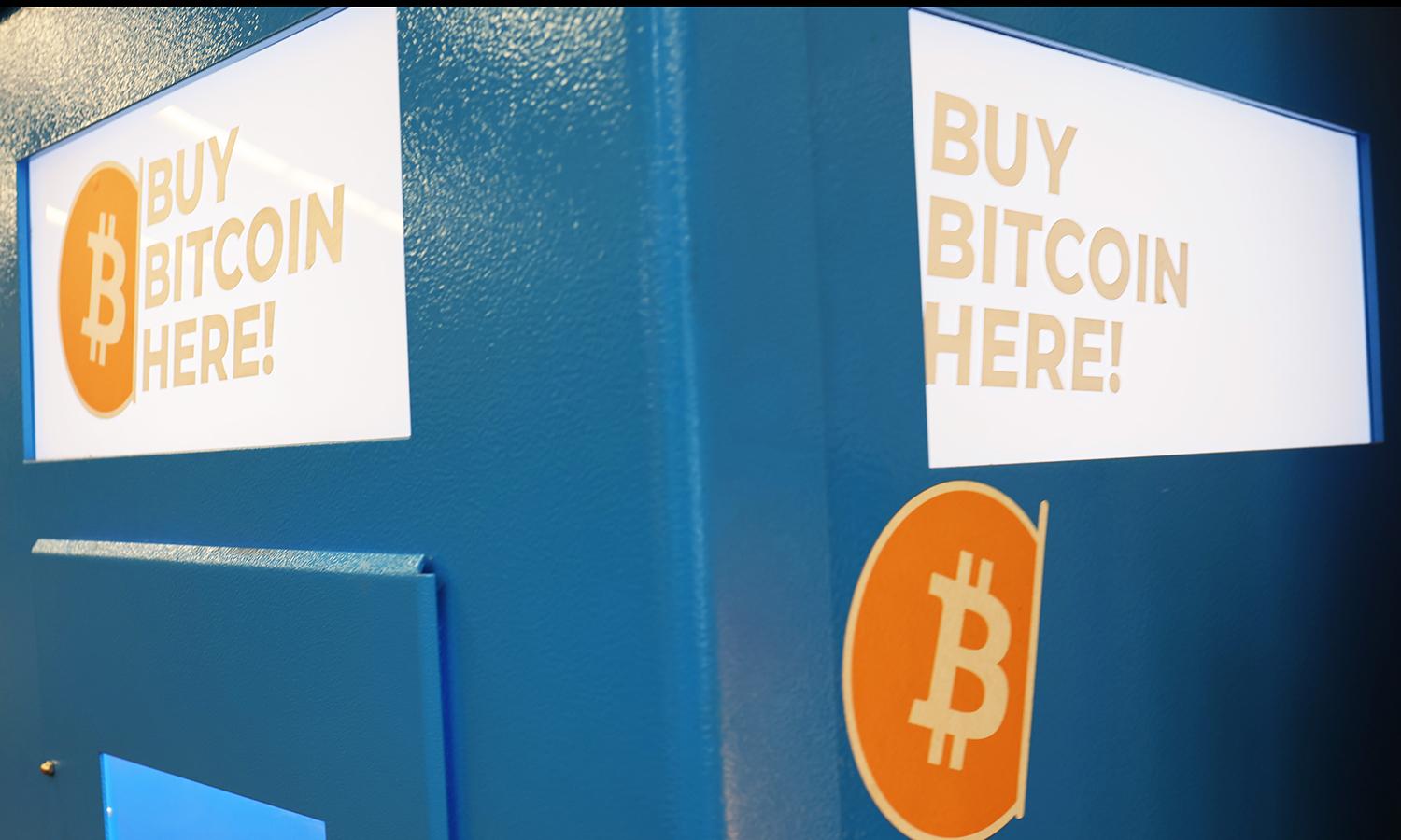 A blue ATM machine for Bitcoin is seen