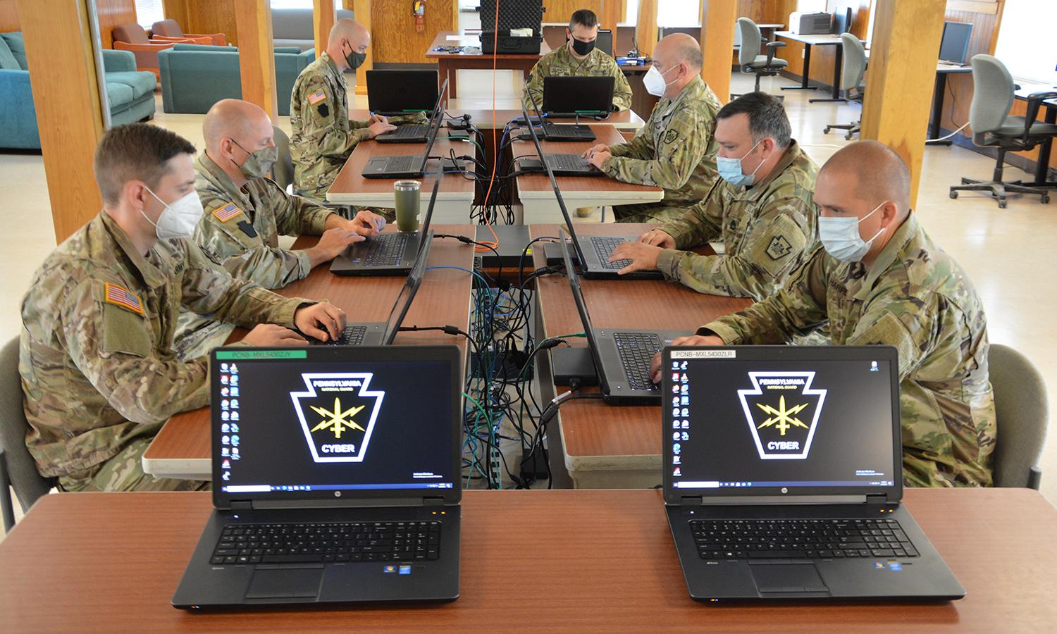 Soldiers participate in a cyberwar exercise
