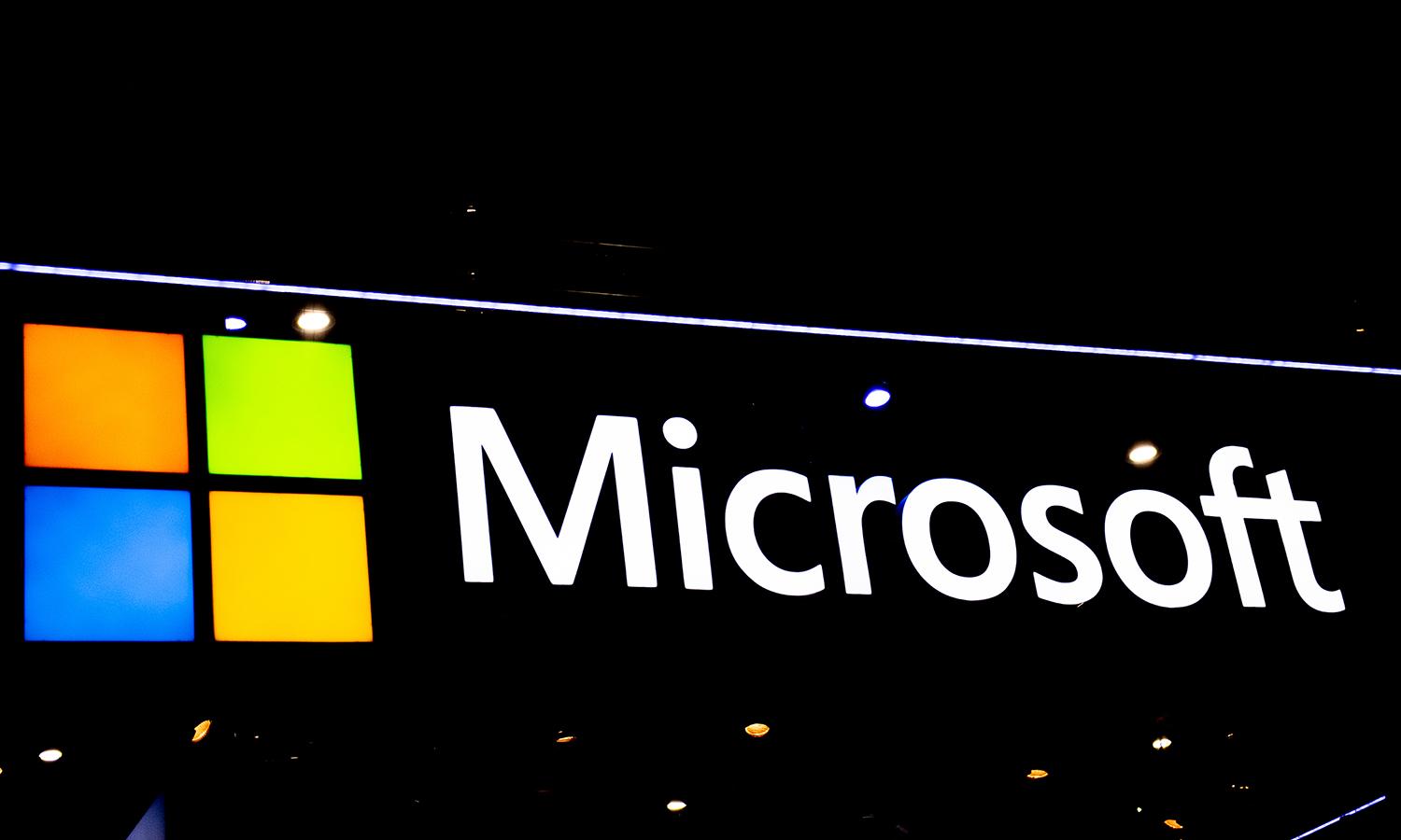 A Microsoft logo is illuminated