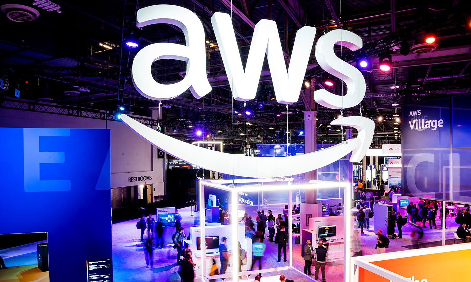 Attendees walk through an expo hall during AWS re:Invent 2022.