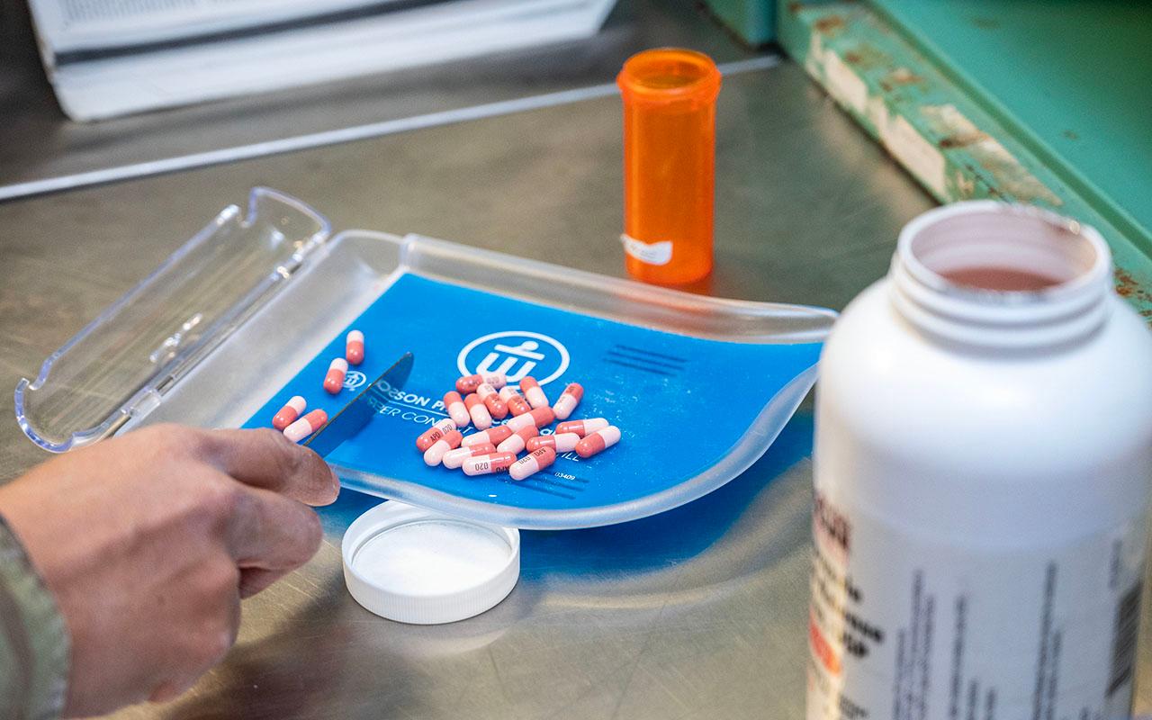 A pharmacy technician prepares inpatient medication orders