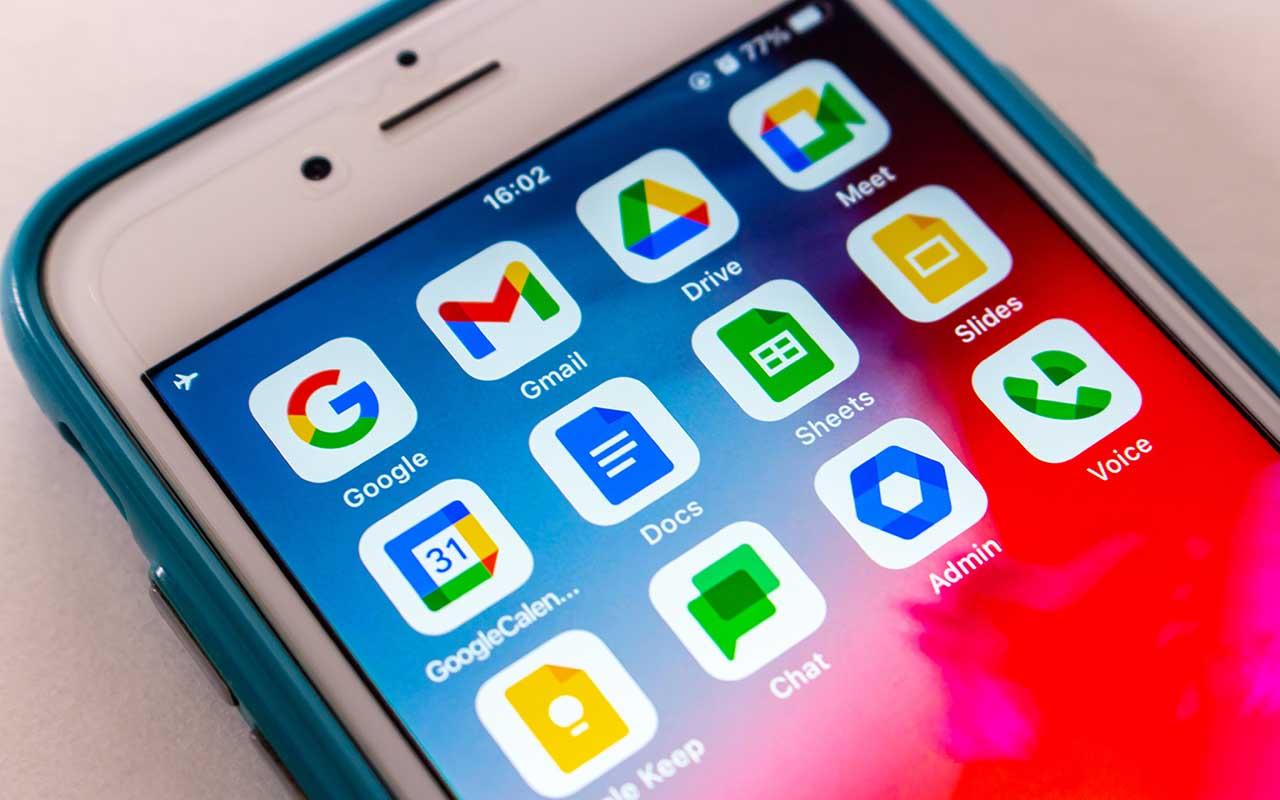 Google app icons are seen on a smartphone screen