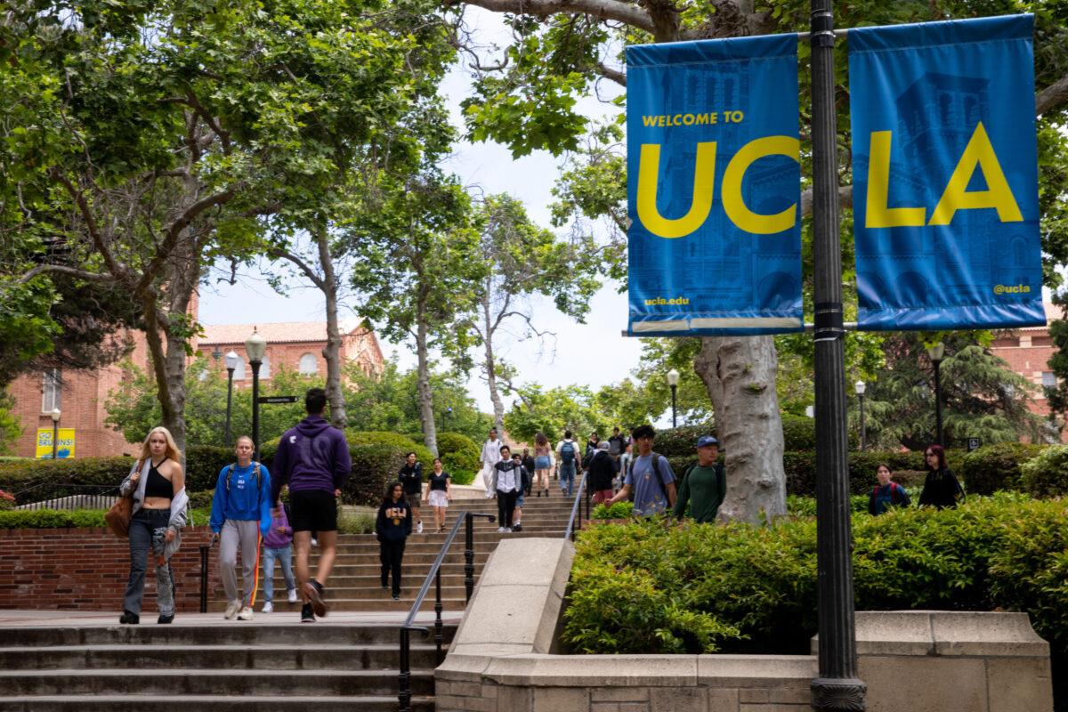 Signage and people along Bruin Walk East, on the UCLA Campus in Los Angeles, CA, Wednesday, May 17, 2023. The University confirmed Tuesday that they were victims in the MOVEit hack disclosed in May. (Jay L. Clendenin / Los Angeles Times via Getty Images)