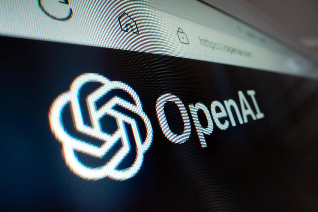 A close-up view of OpenAI logo on its website.